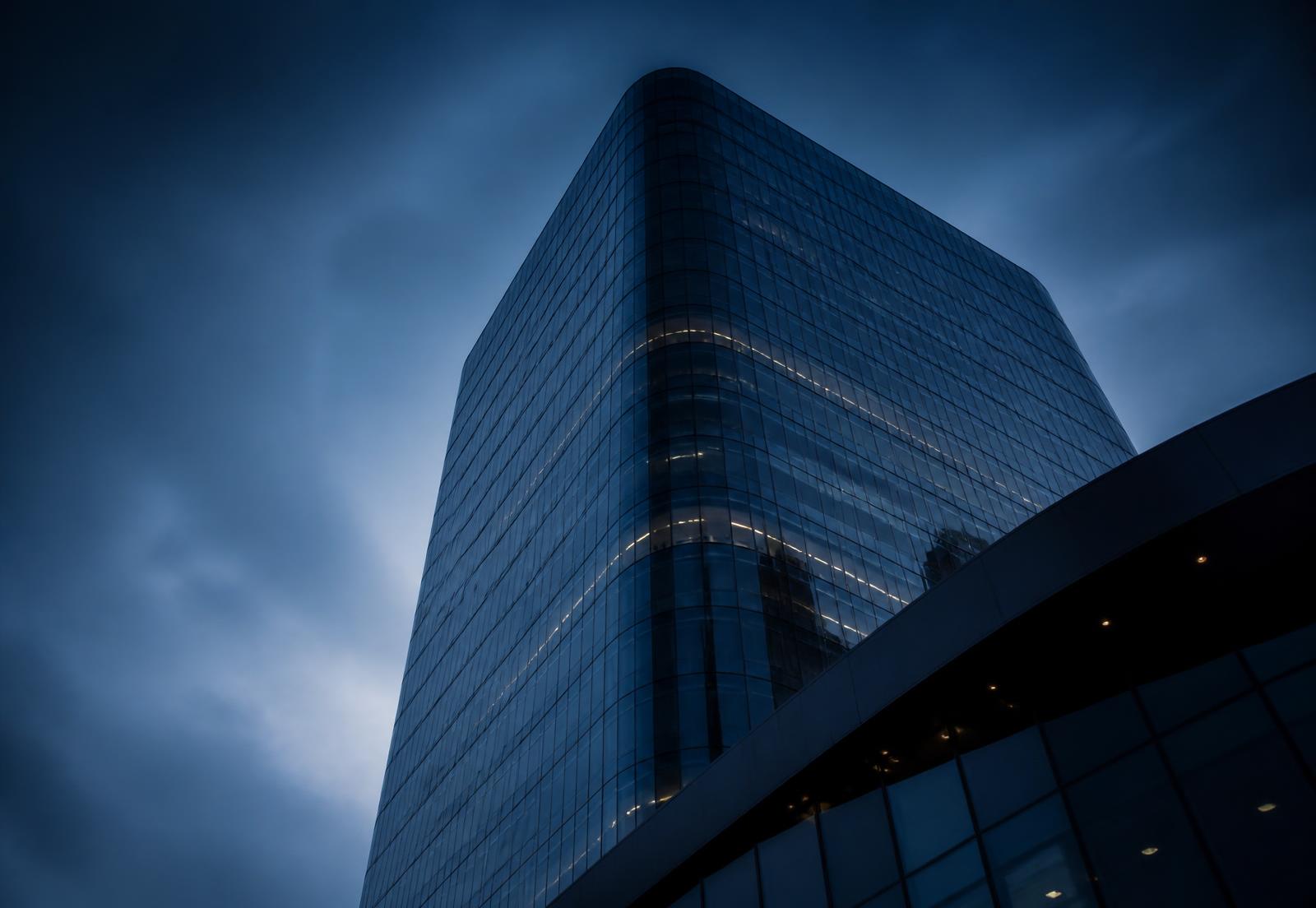 Modern corporate tower at dusk